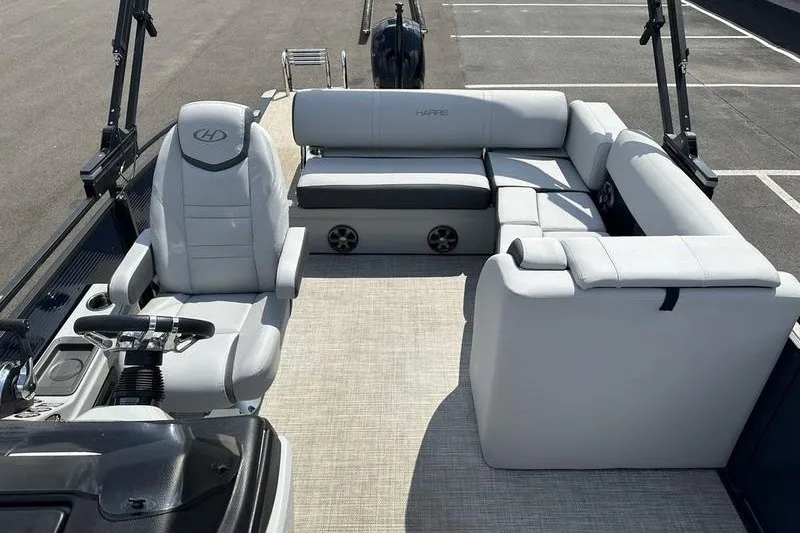 Slide: The Image of Luxurious interior of 2020 Harris Solstice 230 SL pontoon boat with plush seating. - 13