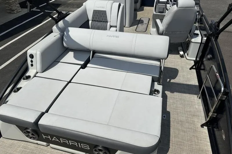 Slide: The Image of 2020 Harris Solstice 230 SL pontoon boat with spacious seating and modern design. - 9