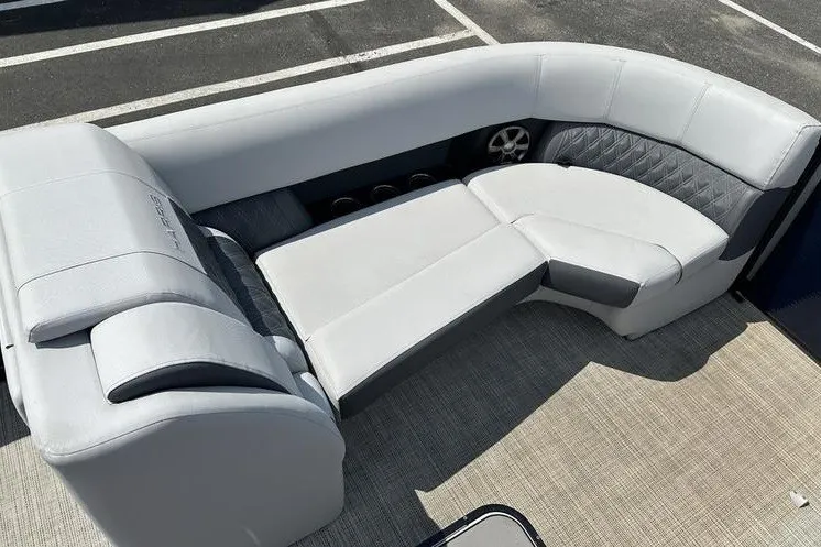 Slide: The Image of 2020 Harris Solstice 230 SL boat interior with luxurious gray seating and cup holders. - 4