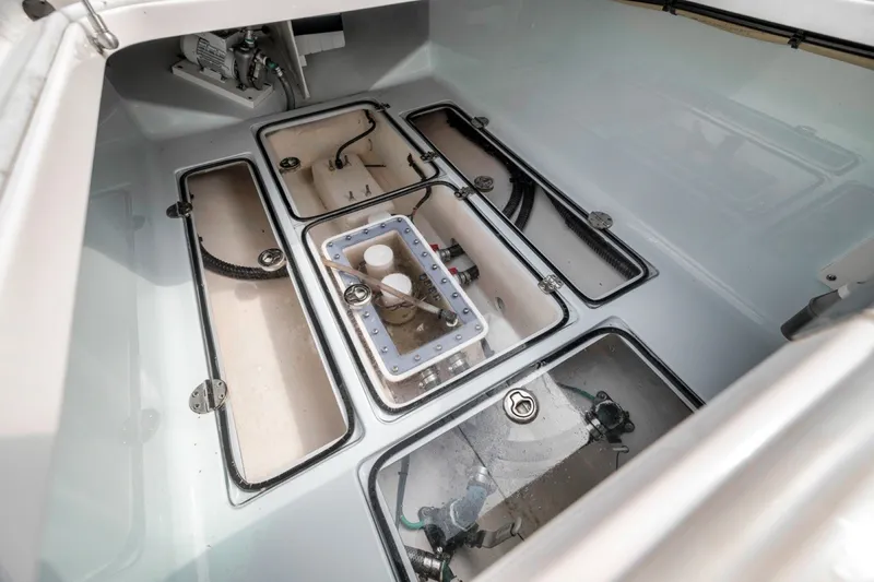 Slide: The Image of Open storage compartments on a 2020 Bahama 41 boat deck. - 39