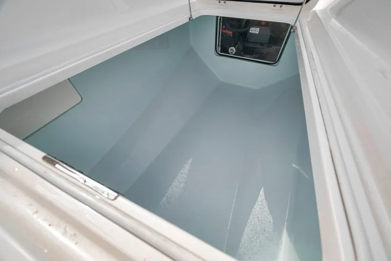 Slide: The Image of Spacious storage compartment in 2020 Bahama 41 boat, featuring a clean, white interior. - 22