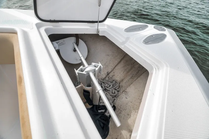 Slide: The Image of Open anchor storage on 2020 Bahama 41 boat, featuring ropes and anchor equipment. - 16