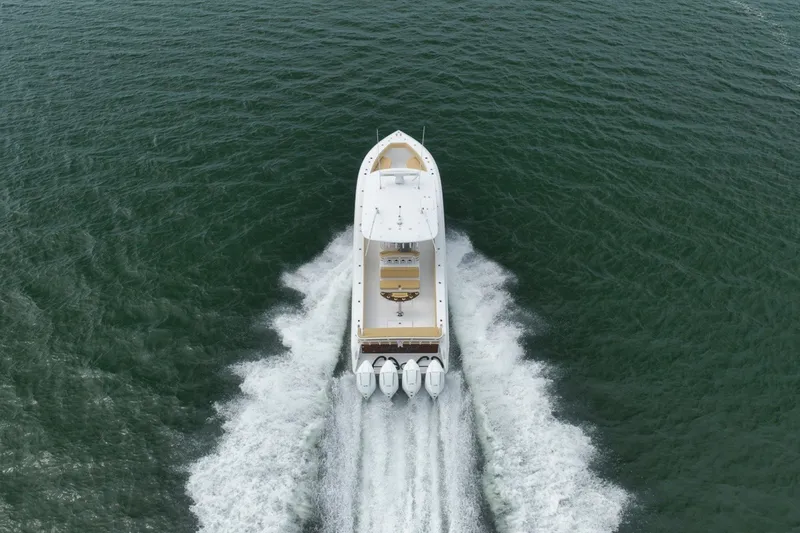 Slide: The Image of Bahama 41 boat cruising on open water, 2020 model, aerial view. - 47
