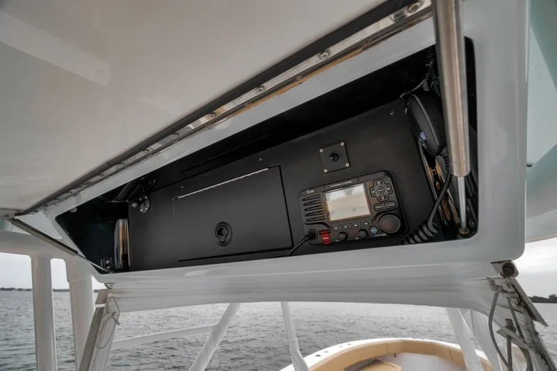 Slide: The Image of 2020 Bahama 41 boat console with electronic equipment and radio system. - 30