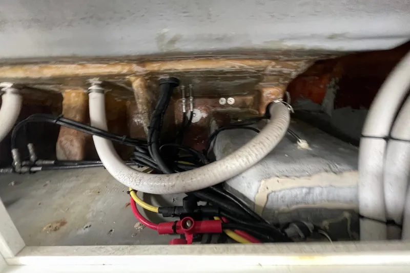 Slide: The Image of 1998 Donzi 29 ZF Cuddy boat interior wiring and plumbing details. - 48