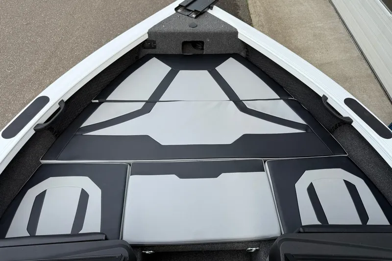 Slide: The Image of 2024 Crestliner 1850 Super Hawk boat interior with sleek, modern seating design. - 7