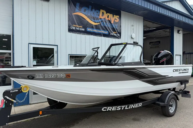 Slide: The Image of 2024 Crestliner 1850 Super Hawk boat on trailer outside Lake Days Marine dealership. - 2