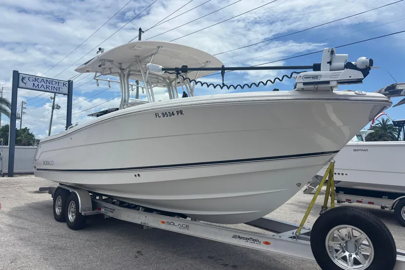 The Image of 2014 Robalo R300 Center Console boat on trailer at Grander Marine dealership. - 0