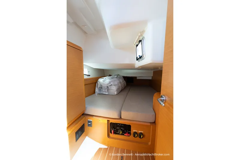 Slide: The Image of Cozy cabin interior of 2016 Jeanneau Sun Odyssey 439 sailboat with comfortable bedding. - 62