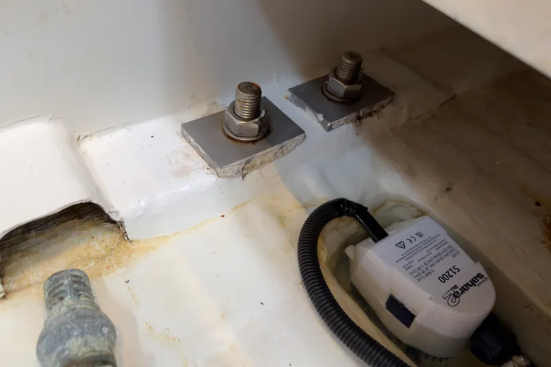 Slide: The Image of Bilge area of 2016 Jeanneau Sun Odyssey 439 with bolts and pump. - 76