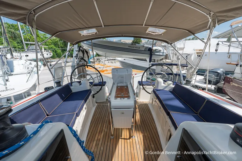Slide: The Image of Spacious cockpit of 2016 Jeanneau Sun Odyssey 439 with dual steering wheels and blue seating. - 29