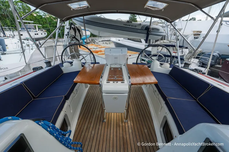 Slide: The Image of Cockpit of 2016 Jeanneau Sun Odyssey 439 sailboat with dual steering wheels. - 30