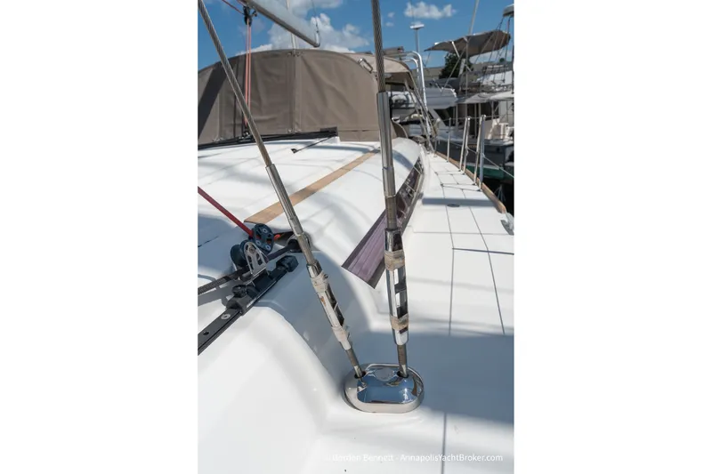 Slide: The Image of 2016 Jeanneau Sun Odyssey 439 sailboat deck with rigging details under clear sky. - 22