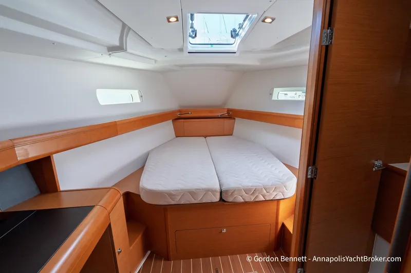 Slide: The Image of Interior cabin of 2016 Jeanneau Sun Odyssey 439 yacht, featuring a cozy double bed. - 57