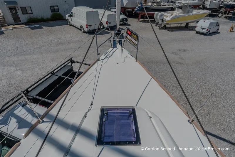 Slide: The Image of 2016 Jeanneau Sun Odyssey 439 yacht deck view at a marina. - 16