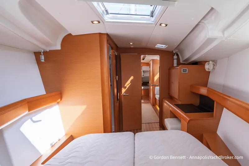 Slide: The Image of Interior of 2016 Jeanneau Sun Odyssey 439 yacht, featuring modern wood finishes and natural light. - 58