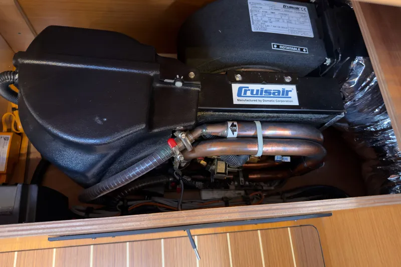 Slide: The Image of Cruisair unit in 2016 Jeanneau Sun Odyssey 439 yacht, showcasing marine air conditioning system. - 72