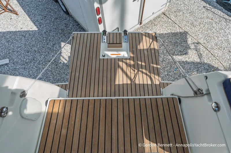 Slide: The Image of Teak deck of 2016 Jeanneau Sun Odyssey 439 yacht, showcasing elegant design. - 37