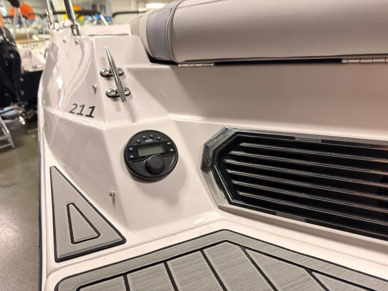 Slide: The Image of Close-up of a Starcraft 211SVXIO boat's stern with speaker and controls. - 10