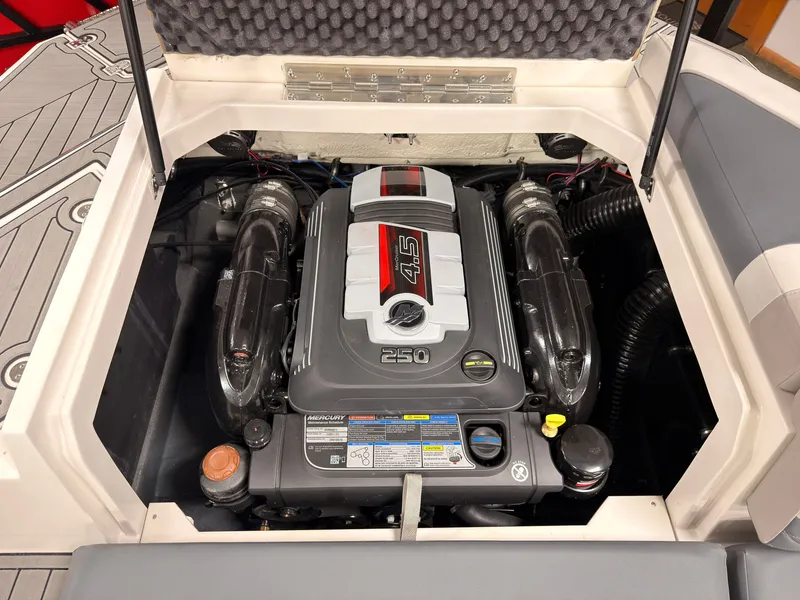 Slide: The Image of The engine compartment of a 2027 Starcraft 211SVXIO features a powerful 4.5-liter engine. - 14