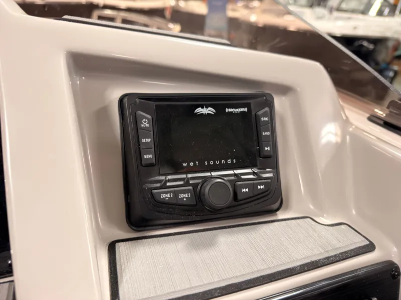 Slide: The Image of The image shows a Wet Sounds audio system on a Starcraft 211SVXIO boat. - 25