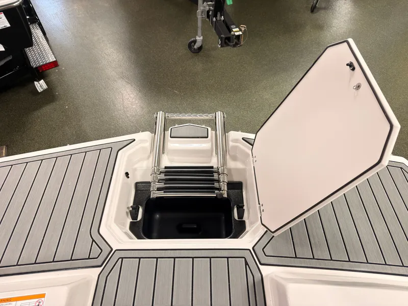 Slide: The Image of The image shows an open hatch on a boat with a retractable ladder. - 43
