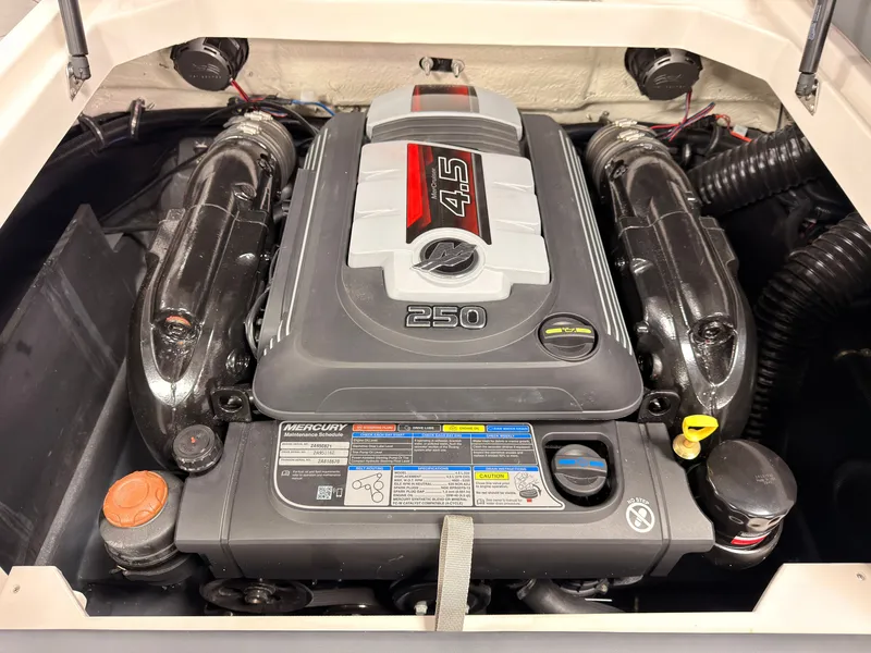 Slide: The Image of The engine compartment of a 2027 Starcraft 211SVXIO features a powerful 4.5-liter engine. - 15