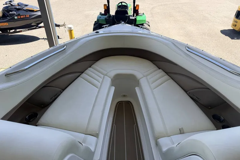 Slide: The Image of Interior view of a 2008 Cobalt 282 boat with white seating. - 21