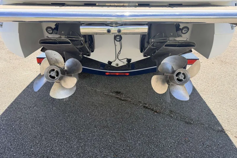 Slide: The Image of Rear view of 2008 Cobalt 282 boat showing dual propellers on a trailer. - 5