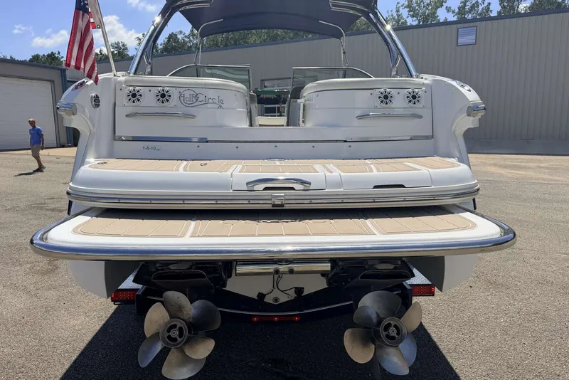 Slide: The Image of 2008 Cobalt 282 boat rear view with dual propellers and swim platform. - 7