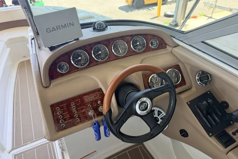 Slide: The Image of Dashboard of a 2008 Cobalt 282 boat with Garmin navigation system. - 23