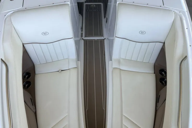 Slide: The Image of Interior of a 2008 Cobalt 282 boat featuring white and beige seating. - 20