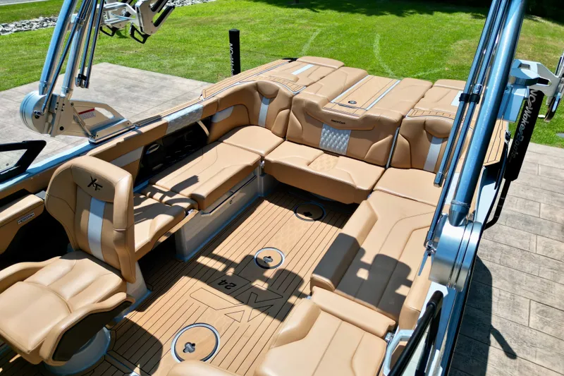Slide: The Image of Luxurious interior of 2026 MasterCraft XT24 boat with tan leather seating and sleek design. - 13