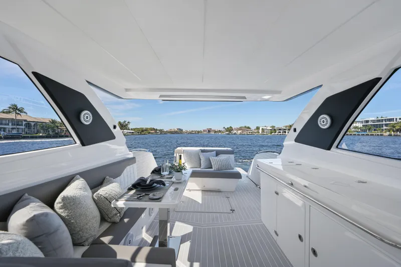 Slide: The Image of Luxurious 2025 Valiatt 380 Bowrider interior with elegant seating and scenic waterfront view. - 11
