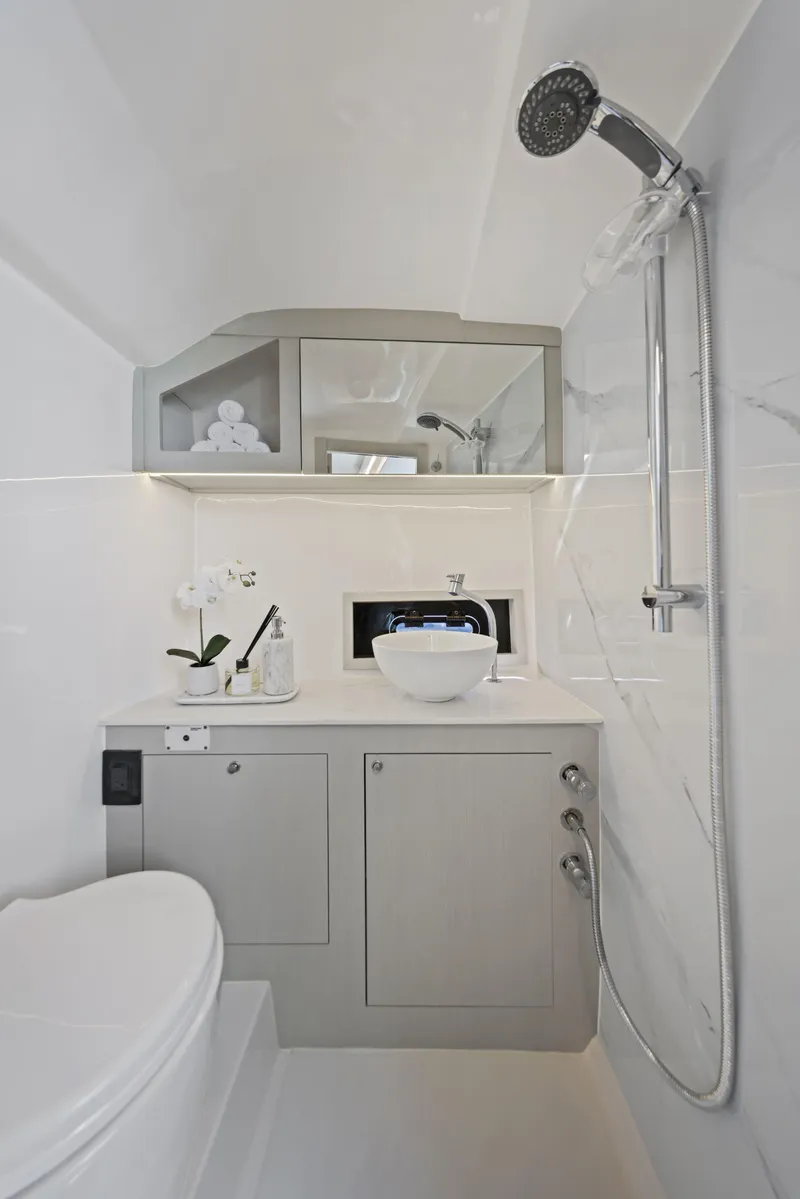Slide: The Image of Modern bathroom in 2025 Valiatt 380 Bowrider boat, featuring sleek fixtures and elegant design. - 24