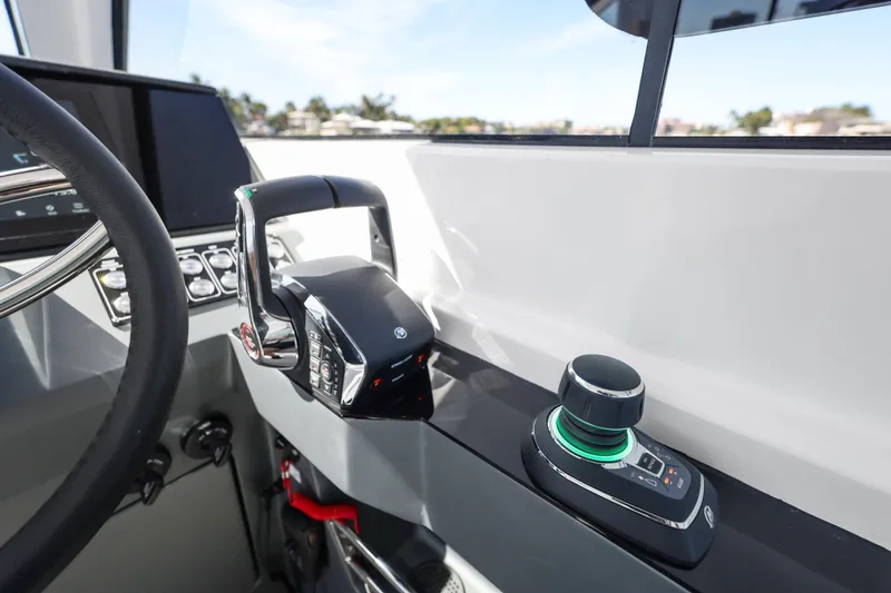 Slide: The Image of 2025 Valiatt 380 Bowrider helm with modern controls and steering wheel. - 10