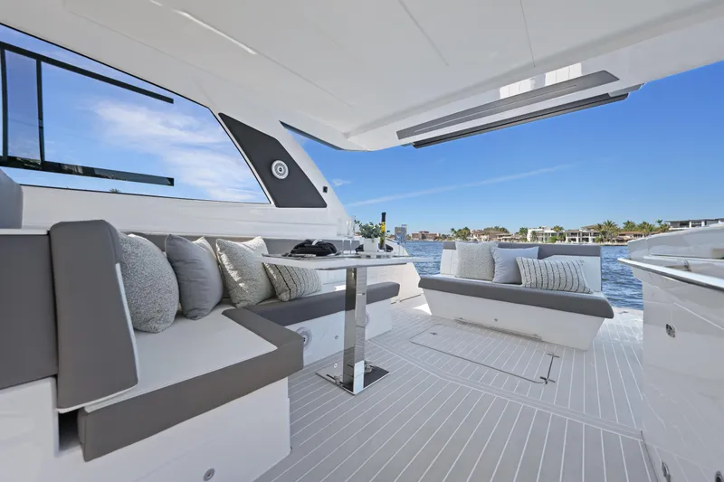 Slide: The Image of Luxurious 2025 VALIATT YACHTS 380 Bowrider interior with elegant seating and scenic water view. - 17