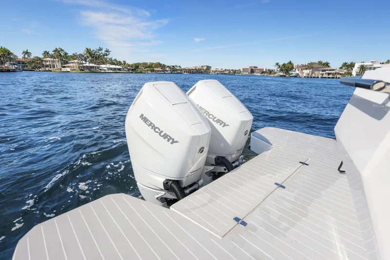 Slide: The Image of 2025 VALIATT YACHTS 380 Bowrider with dual Mercury outboard engines on a sunny day. - 8