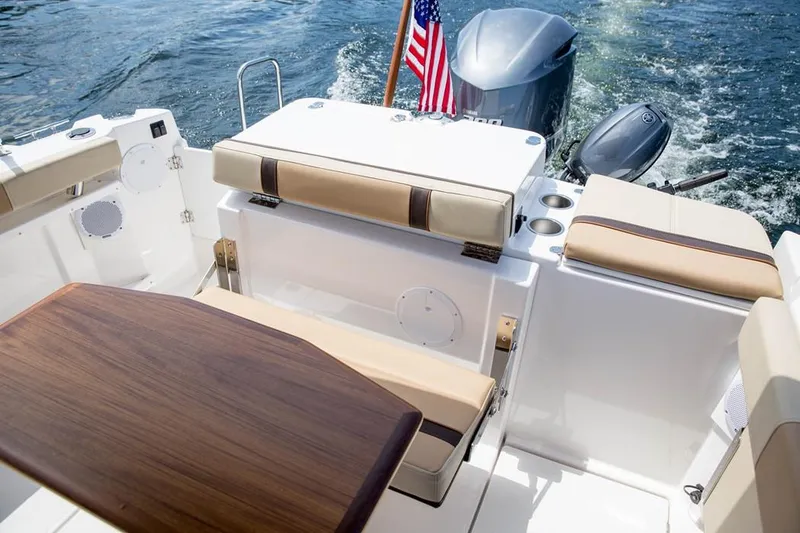 Slide: The Image of Manufacturer Provided Image: 2019 Ranger Tugs R-27 boat interior with seating and table. - 13