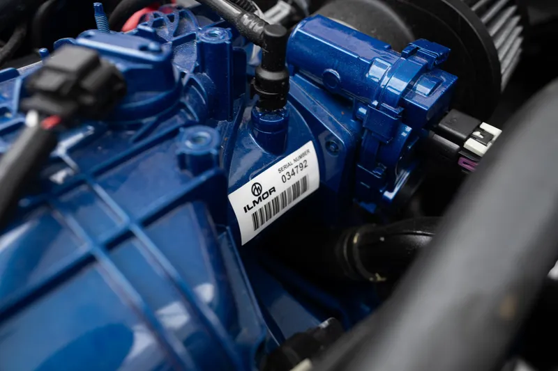 Slide: The Image of Close-up of a 2023 MasterCraft XT24 engine component with Ilmor branding. - 32