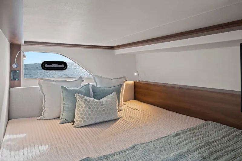 Slide: The Image of Cozy cabin interior of 2025 Valiatt 380GT yacht with ocean view window. - 14