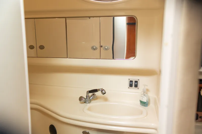 Slide: The Image of Bathroom sink area in a 2005 Sea Ray 340 Sundancer yacht. - 18