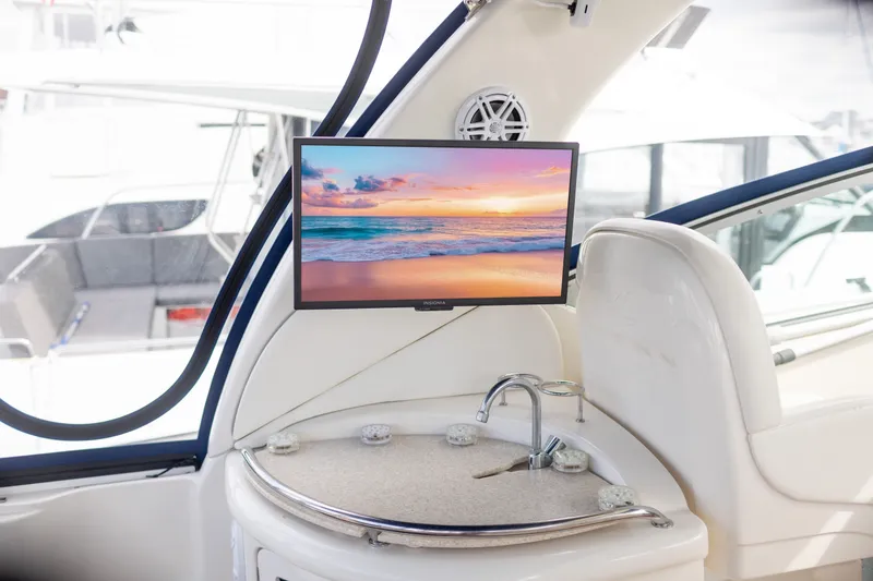 Slide: The Image of Interior of 2005 Sea Ray 340 Sundancer with TV and sink. - 8
