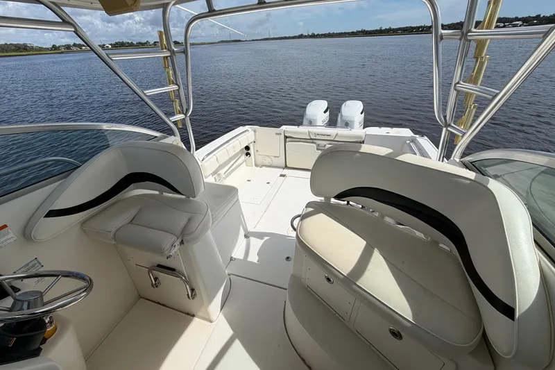 Slide: The Image of 2004 Seaswirl Striper 2901 Walkaround O/B boat interior with dual outboard motors. - 26