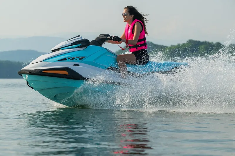 Slide: The Image of Manufacturer Provided Image: 2026 Yamaha WaveRunner VX jet ski on water, woman riding, wearing pink life vest. - 5