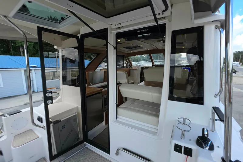 Slide: The Image of Interior view of 2027 Cutwater C-32 Coupe, showcasing modern seating and design. - 30