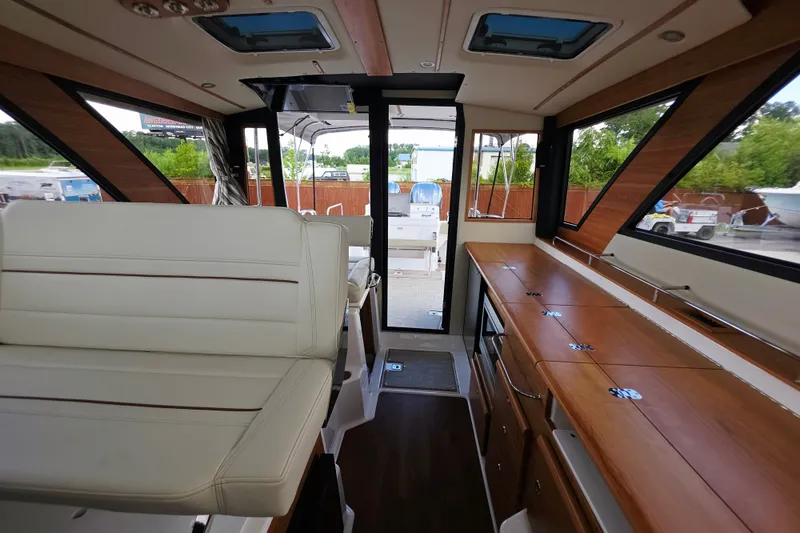 Slide: The Image of Interior of 2027 Cutwater C-32 Coupe, featuring sleek design and modern amenities. - 13