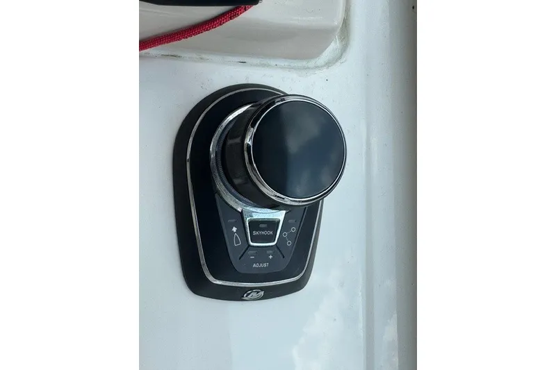 Slide: The Image of Joystick control panel on 2023 Boston Whaler 325 Conquest boat. - 57