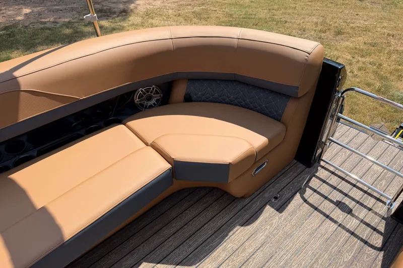 Slide: The Image of Luxurious seating on 2027 Harris Grand Mariner 250 SLDH pontoon boat, featuring tan upholstery. - 24