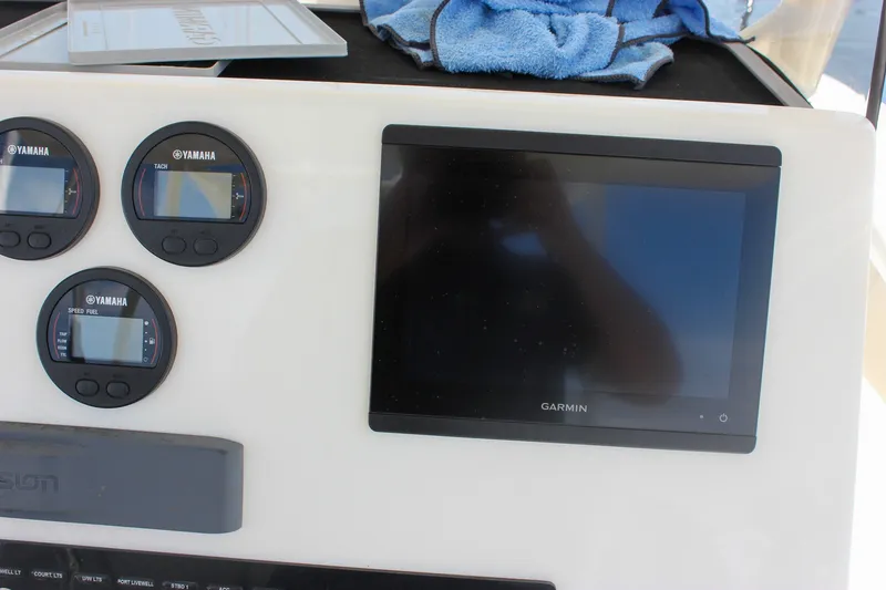 Slide: The Image of Dashboard of 2022 Key West 263 FS with Yamaha gauges and Garmin display. - 23